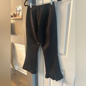 Anthropologie M cropped black pants with ruffled hem.